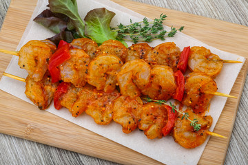 Raw tiger shrimps skewer