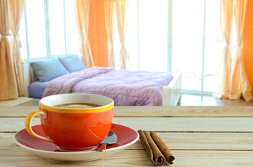 coffee cup with bed background