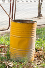 yellow trashcan of recycle old fuel tank