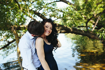 Fototapeta premium man and woman at the lake