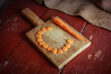 carrot slices on a cutting board