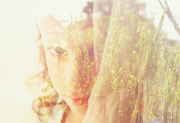 Double exposure of romantic nature landscape and cute happy kid

