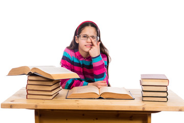 Funny girl with pile of books