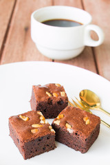 brownies with cup of coffee on table