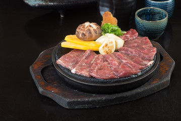 japanese cuisine. beef cube on the background