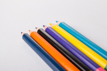 Colour pencils isolated on white background close up
