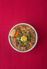 japanese cuisine. beef soup on the background