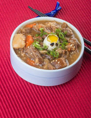 japanese cuisine. beef soup on the background