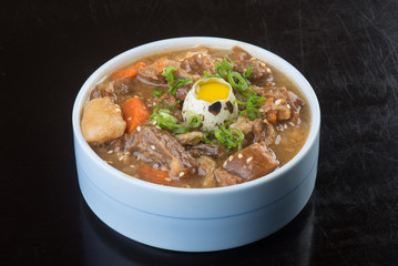 japanese cuisine. beef soup on the background