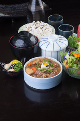 japanese cuisine. beef soup on the background