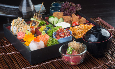 japanese cuisine. lunch box set on the background