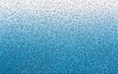 Blue wet surface with water drops 