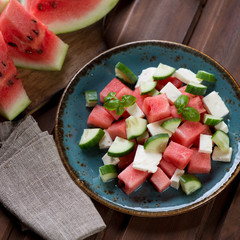 Close-up of watermelon, cucumber and bryndza cheese summer salad