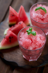 Glasses with watermelon granita, close-up, selective focus