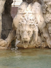 Fototapeta na wymiar Lion drinking fountain