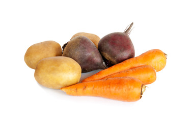 Fresh vegetables carrots, beetroots and potatoes isolated on whi