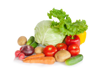 Composition with raw vegetables on white