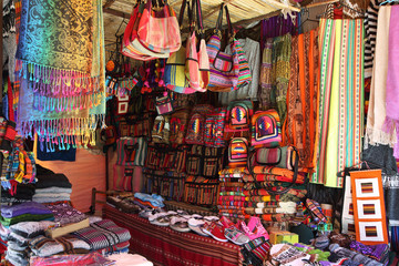 Market stall with colorful indigenous clothes, Argentina