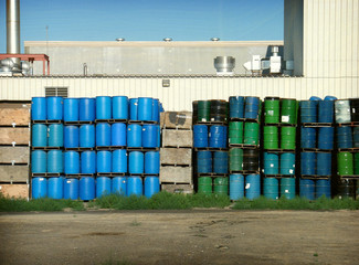 old waste containers stacked