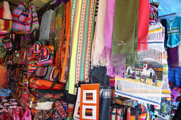 Market stall with colorful indigenous clothes, Argentina