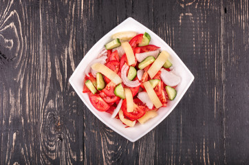Salad with cucumbers and tomatoes