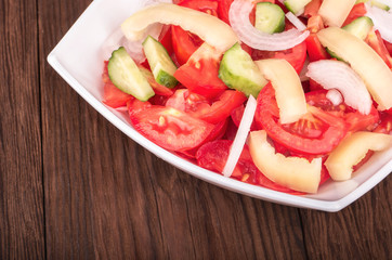 Salad with cucumbers and tomatoes