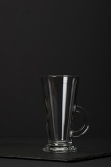 Empty Glass on Slate Stone Mat