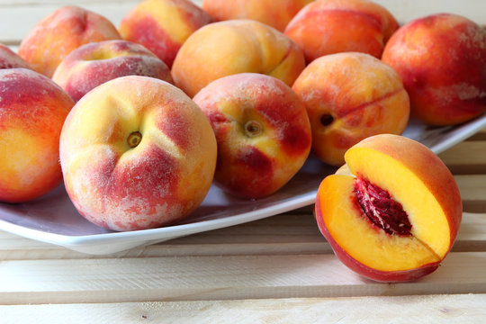 Ripe peaches on a plate..