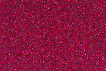 Crimson glitter background texture.