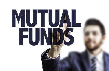 Business man pointing the text: Mutual Funds