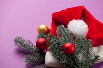 Santas hat and branch with toys