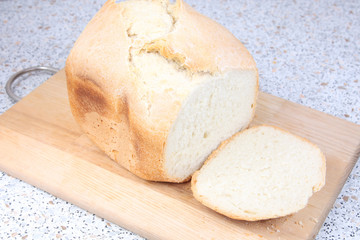 sliced white bread on wooden board
