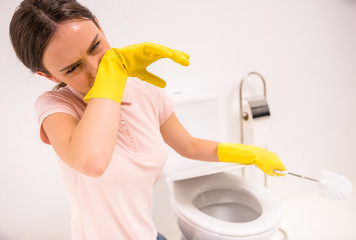 Cleaning the toilet