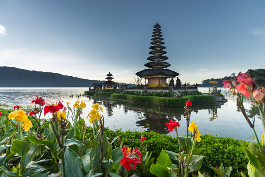 flowers Pura Ulun Danu temple on a lake Beratan, Bali, Indonesia, HDR style