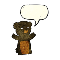 cartoon black bear cub with speech bubble
