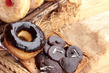 Chocolate donut and strawberry jam donut of delicious