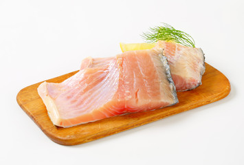 Raw carp fillets