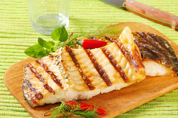 Grilled carp fillets