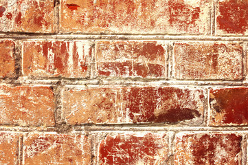 Wall from an old red brick. Textural background. Old red brick