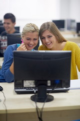 students group in computer lab classroom