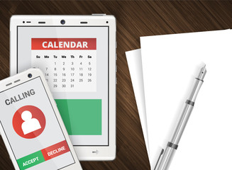 Smartphone and tablet office background with wooden background