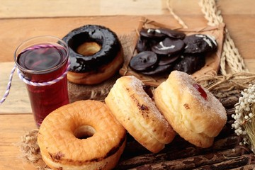 Chocolate donut and strawberry jam donut of delicious