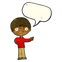 Obraz na płótnie Canvas cartoon happy boy pointing with speech bubble
