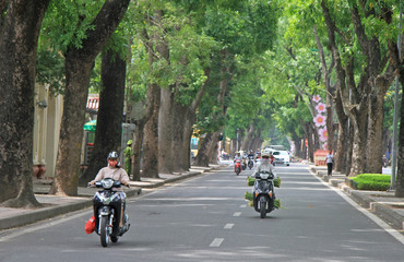 people are riding on motorcycles