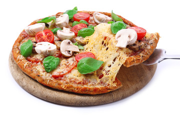 Tasty pizza with vegetables and basil isolated on white
