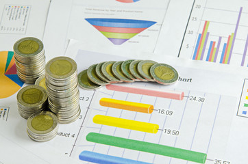 stack of money  coins on graph , business concept