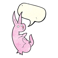cue cartoon rabbit with speech bubble