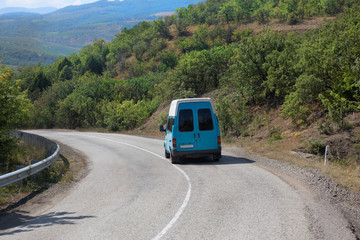Obraz na płótnie Canvas minibus on road in Crimea