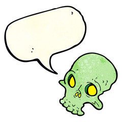 cartoon spooky skull with speech bubble