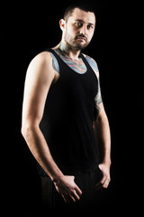 Naklejka premium Studio portrait of a young handsome man. Cinematic Style.